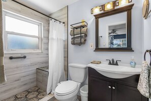 Dutxa, assecador de cabells, bidet i tovalloles 