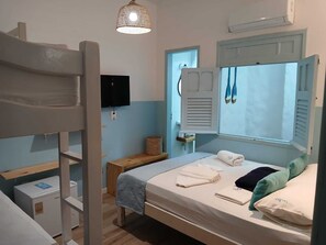 Standard Quadruple Room, Courtyard View | In-room safe, iron/ironing board, free WiFi