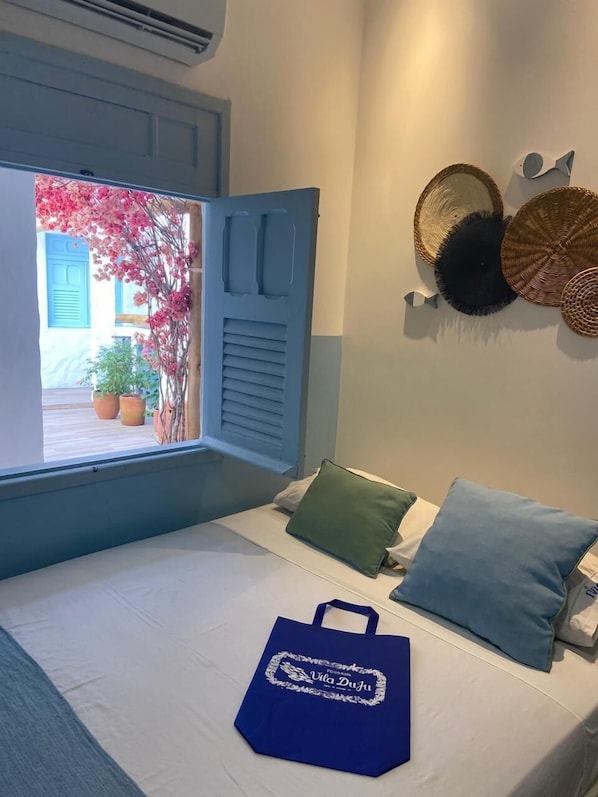 Standard Quadruple Room, Courtyard View | In-room safe, iron/ironing board, free WiFi