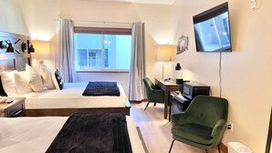 A hotel room with two beds, a desk, a TV, and a view of the outside. - 2066 | Elevated Stay | 2Q Near Park City + Pool (Midway)