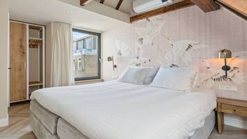 2 slaapkamers, een strijkplank/strijkijzer, internet