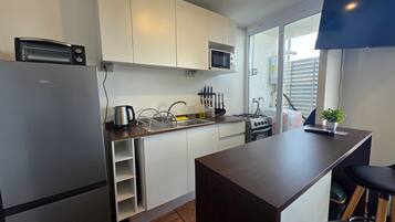 Apartment | Private kitchen | Microwave, oven, electric kettle, cookware/dishes/utensils