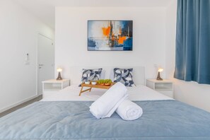 2 chambres, fer et planche à repasser, accès à Internet, literie fournie