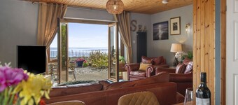 Escape to this charming 2 bedroom dog friendly house with amazing sea views