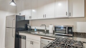 Fridge, stovetop, coffee/tea maker