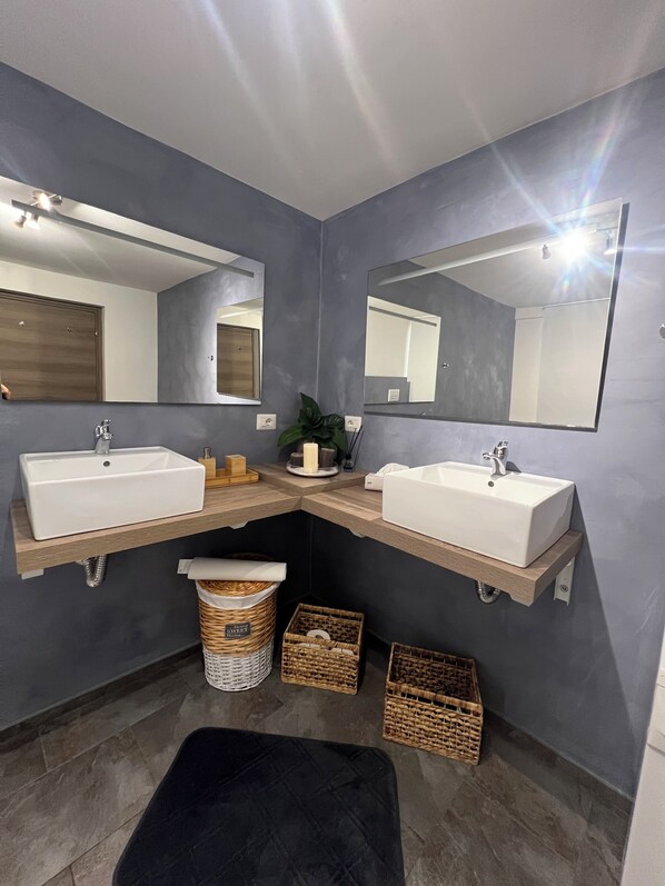 Hair dryer, towels, soap, shampoo