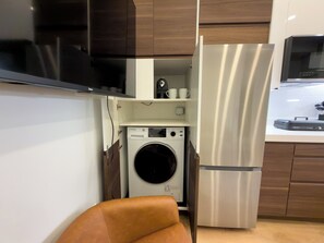 Suite Deluxe, 1 habitación, vista a la ciudad | Lavandería