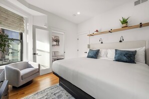 Executive Suite, 2 Bedrooms, City View | Down comforters, individually decorated, individually furnished - Symple Live (Boston)