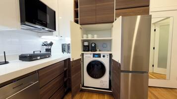 Suíte executiva, 2 quartos, vista para a cidade | Lavanderia