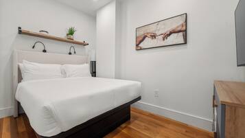 Executive Suite, 2 Bedrooms, City View | Down comforters, individually decorated, individually furnished