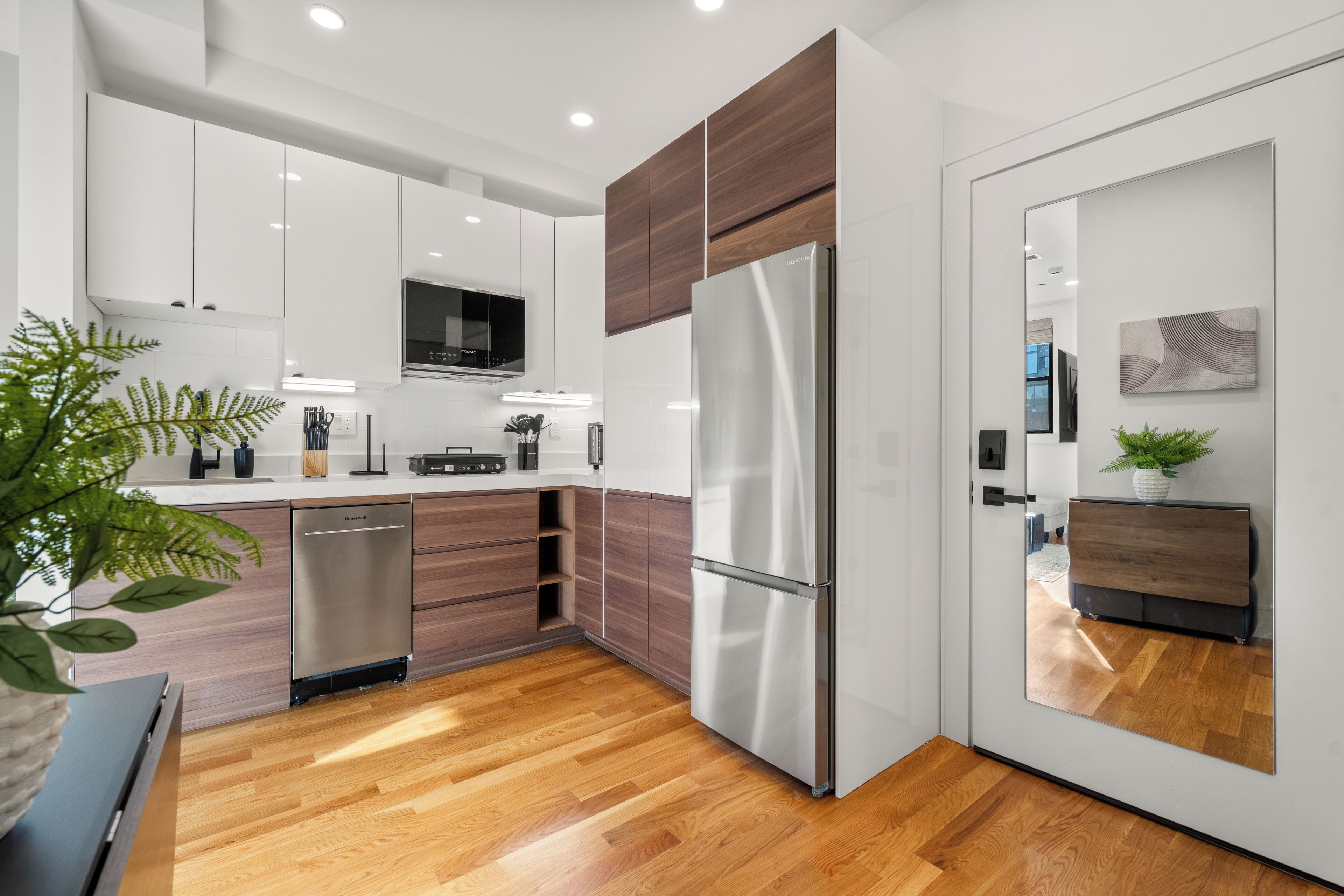 Apartamento executivo, 2 quartos, vista para a cidade | Cozinha privada | Geladeira grande, micro-ondas, cooktop, lava-louças