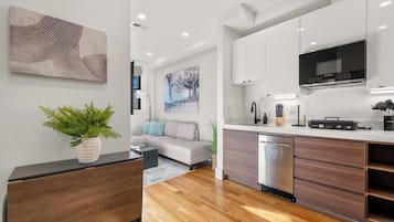 Executive Suite, 2 Bedrooms, City View | Private kitchen | Full-sized fridge, microwave, stovetop, dishwasher