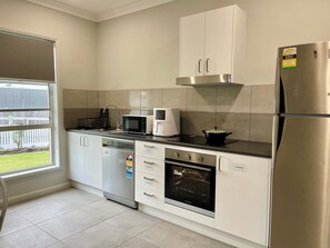 Fridge, microwave, electric kettle, toaster