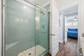 Shower, hair dryer, towels, toilet paper