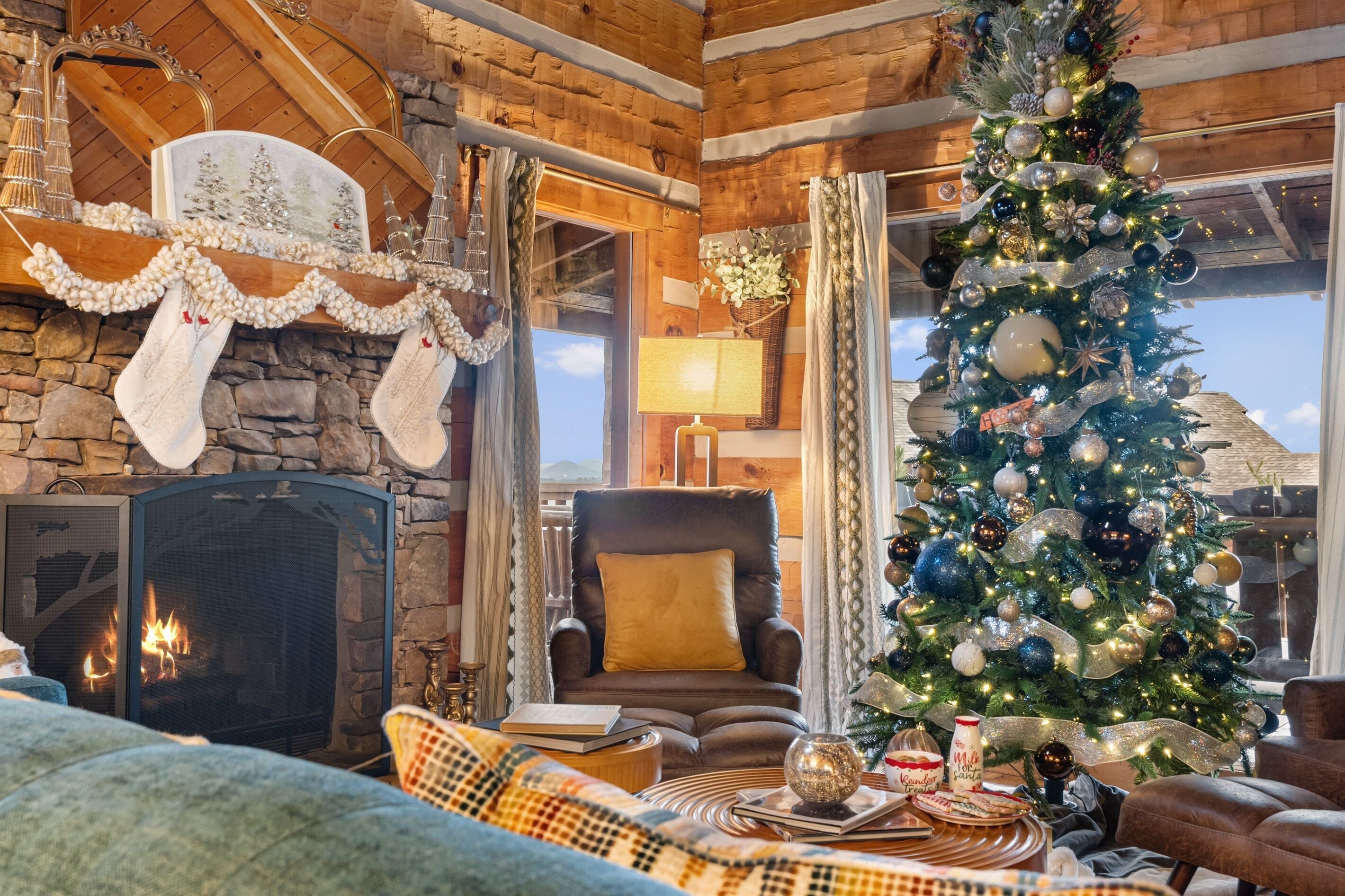 From the glowing fireplace to the beautifully decorated tree, this relaxing corner invites you to slow down and savor the season.