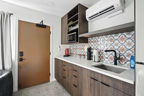 Fridge, microwave, coffee/tea maker, toaster