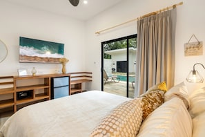 Deluxe Double Room, Private Bathroom, Pool View (Loni Kalea Cabina) | In-room safe, blackout curtains, soundproofing, iron/ironing board