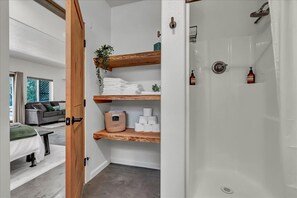 Shower, hair dryer, towels, soap