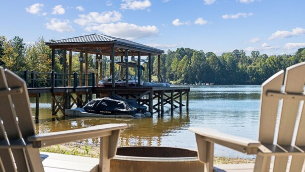 Unclassified image, 1 of 24, button - Lakefront Home| 6BR Home w/ Hot Tub, Private Beach, Dock, & Pontoon Options (Mooresville)