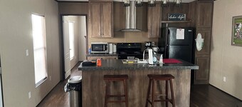 Fishing camp with boat stall cleaning table three bedroom two bath