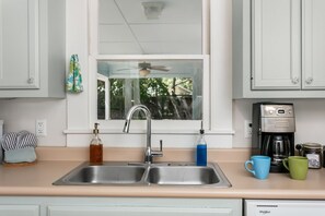 Fridge, microwave, dishwasher, coffee/tea maker