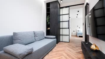 1 dormitori, planxa i posts de planxar, wifi i roba de llit