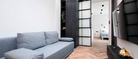 1 slaapkamer, een strijkplank/strijkijzer, wifi, beddengoed