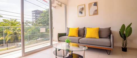 Apartamento Deluxe | Zona de estar