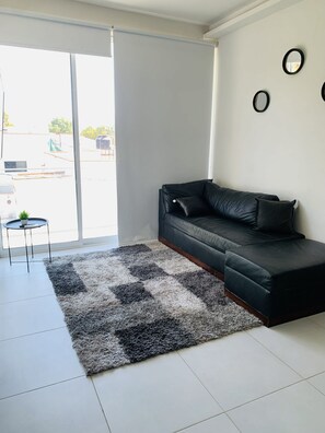 Comfort Apartment, Balcony | Living area