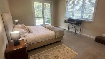 1 bedroom, desk, iron/ironing board, bed sheets
