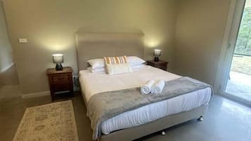 1 bedroom, desk, iron/ironing board, bed sheets