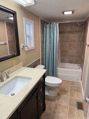 Hair dryer, towels, soap, shampoo
