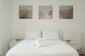 4 habitaciones, tabla de planchar con plancha, wifi y ropa de cama 