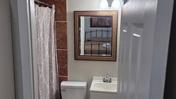Hair dryer, towels, soap, toilet paper