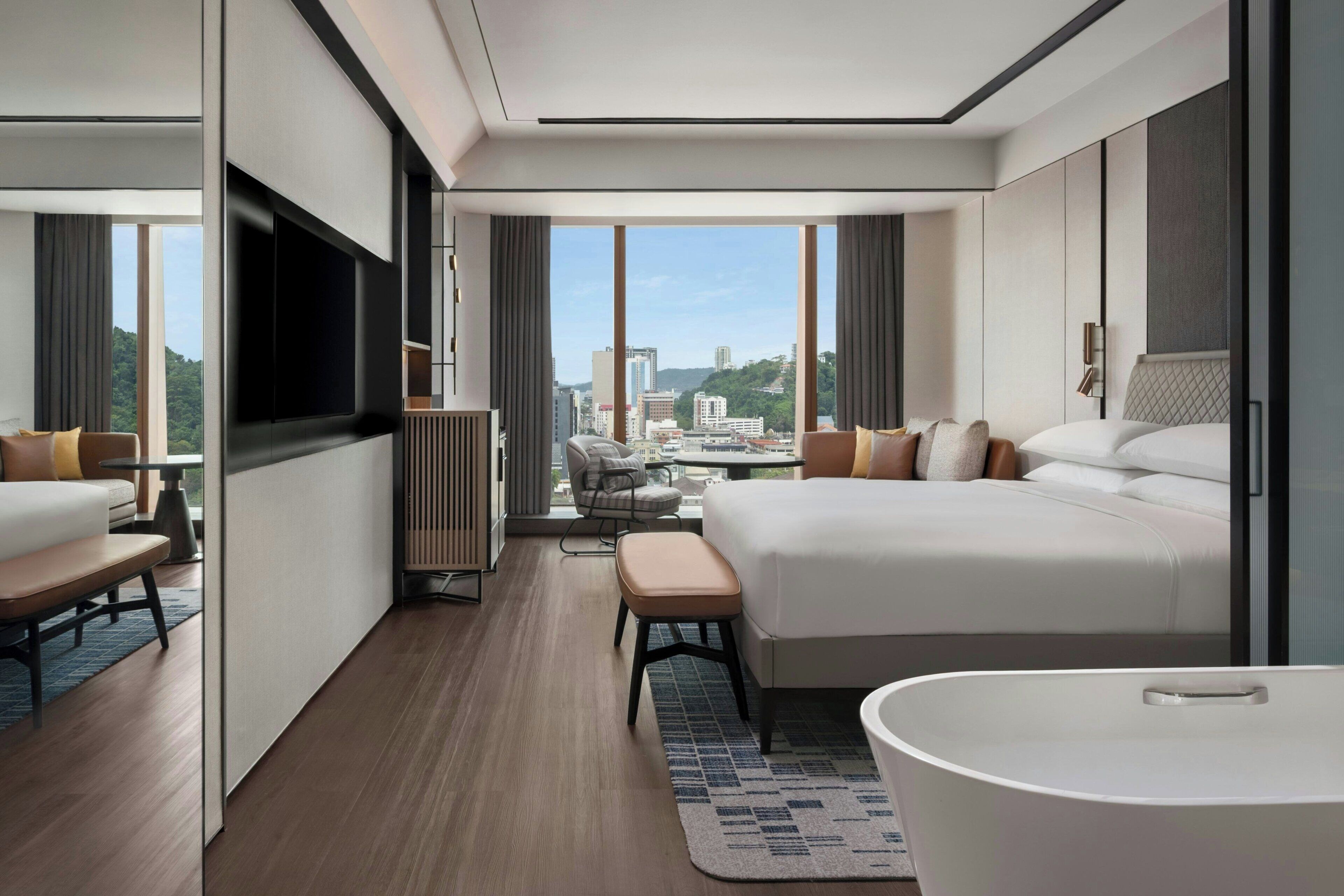 Premium bedding, down duvets, minibar, in-room safe