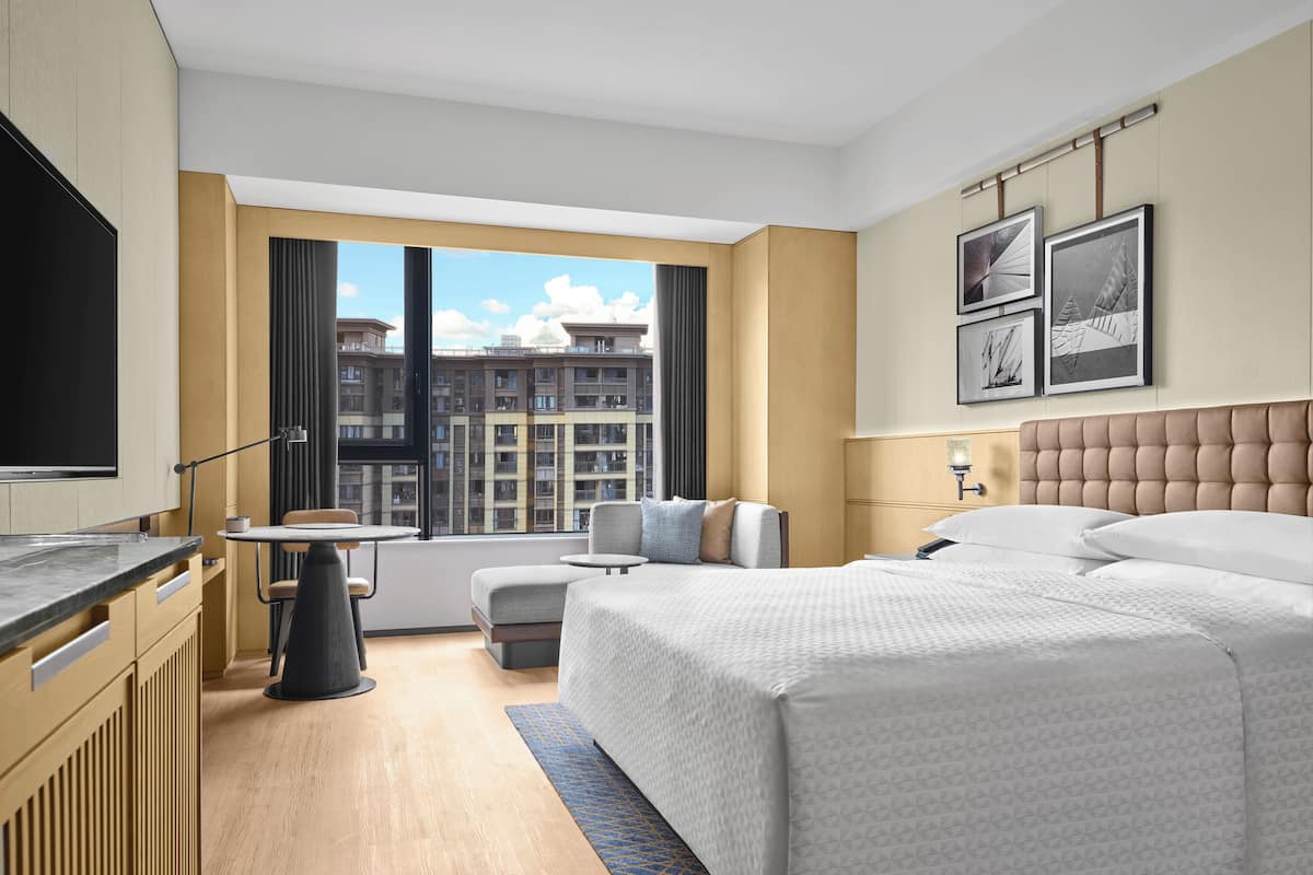 Premier eenpersoonskamer, 1 kingsize bed | Donsdekens, een kluis op de kamer, verduisterende gordijnen, gratis wifi
