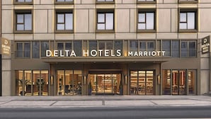 A modern building with the sign 'DELTA HOTELS MARRIOTT' indicating a hotel property. - Delta Hotels by Marriott Istanbul Karakoy (Istanbul)