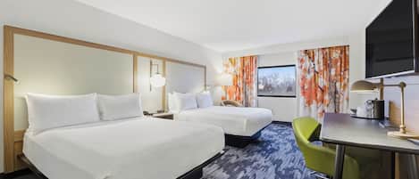 Premium bedding, blackout drapes, iron/ironing board, free WiFi