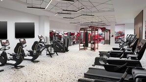 A modern gym with treadmills, stationary bikes, and weight machines. - The Union Hotel, Flemington, A Tribute Portfolio Hotel (Flemington)