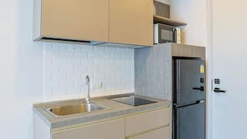 Departamento, balcón, vista a la montaña | Cocineta privada | Refrigerador con congelador, microondas y parrilla de estufa