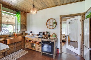 Fridge, microwave, stovetop, coffee/tea maker