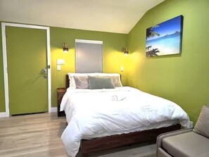 Iron/ironing board, travel crib, free WiFi, bed sheets