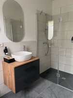 Shower, towels, soap, shampoo