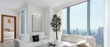 Departamento Deluxe, para no fumadores, vista al canal | Área de sala de estar