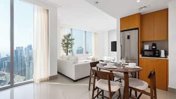 Deluxe Apartment, Non Smoking, Canal View | In-room dining