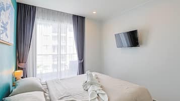 Appartement, balkon | Een kluis op de kamer, verduisterende gordijnen