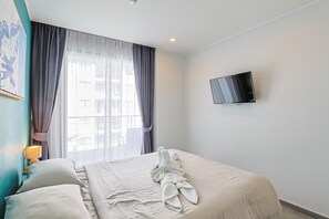 Apartment, Balcony | In-room safe, blackout curtains, iron/ironing board, free WiFi