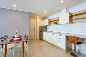 Apartment, Balcony | Private kitchenette | Full-sized fridge, microwave, stovetop, electric kettle