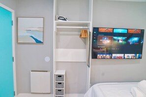 Iron/ironing board, travel crib, free WiFi, bed sheets