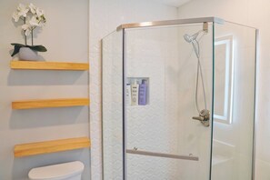 Shower, hair dryer, towels, soap